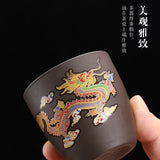 Load image into Gallery viewer, Purple clay changes color when heated, with dragons and phoenixes dancing. High-end master cups, couple cups, kung fu tea sets, tasting cups, and personal cups