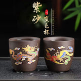Load image into Gallery viewer, Purple clay changes color when heated, with dragons and phoenixes dancing. High-end master cups, couple cups, kung fu tea sets, tasting cups, and personal cups